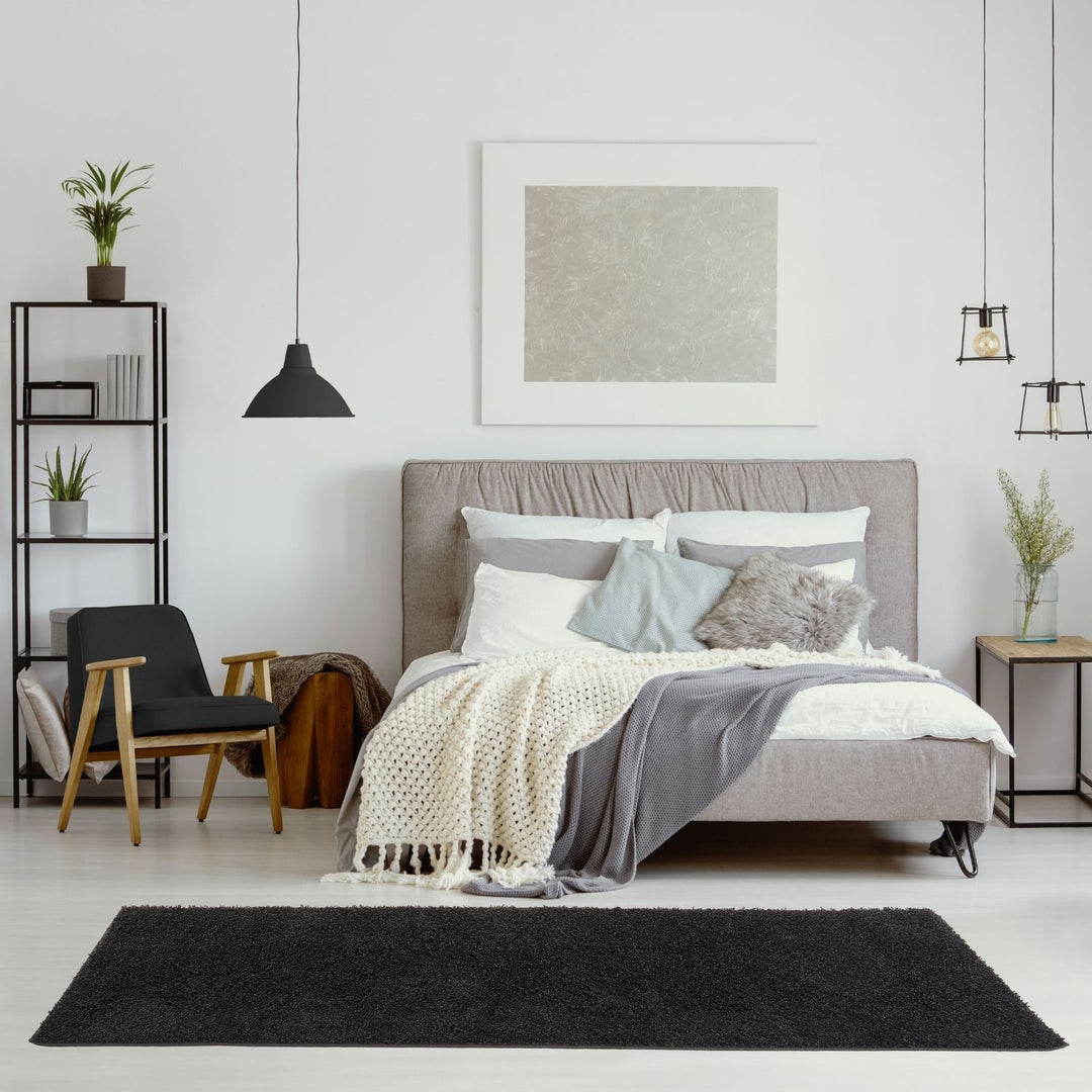 Black shaggy Rug Plain design thick pile, high quality, soft & durable.