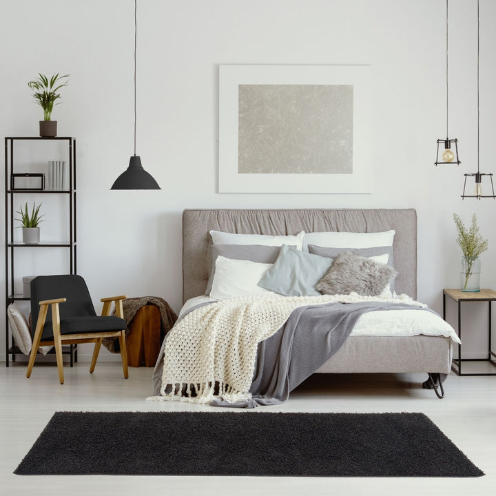 Black shaggy Rug Plain design thick pile, high quality, soft & durable.
