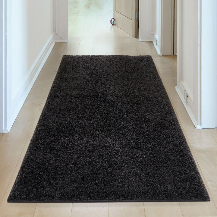 Black shaggy Rug Plain design thick pile, high quality, soft & durable.