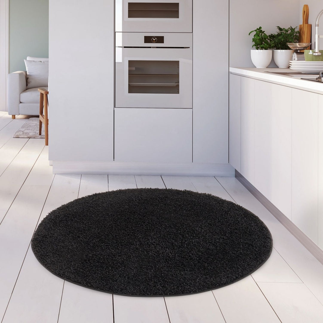 Black shaggy Rug Plain design thick pile, high quality, soft & durable.