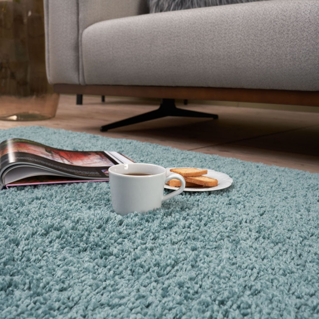 Shaggy duck egg blue rug high quality, thick pile 30 mm, easy to clean.
