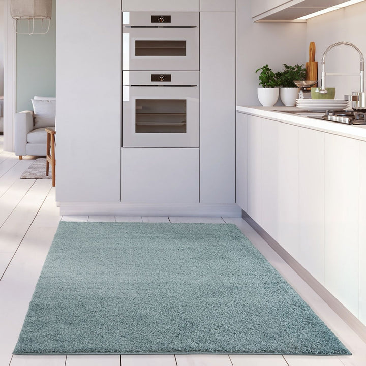 Shaggy duck egg blue rug high quality, thick pile 30 mm, easy to clean.