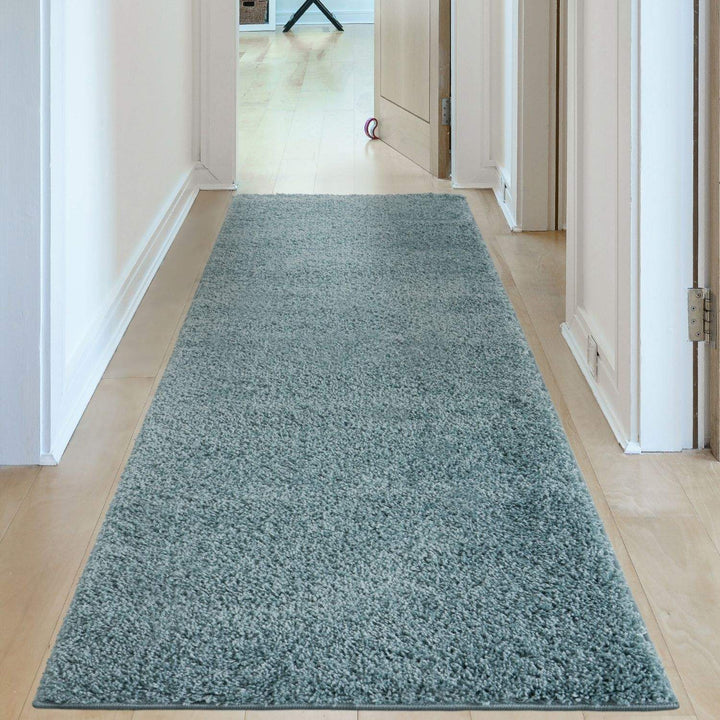 Shaggy duck egg blue rug high quality, thick pile 30 mm, easy to clean.