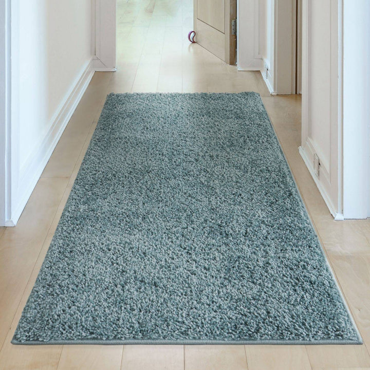 Shaggy duck egg blue rug high quality, thick pile 30 mm, easy to clean.