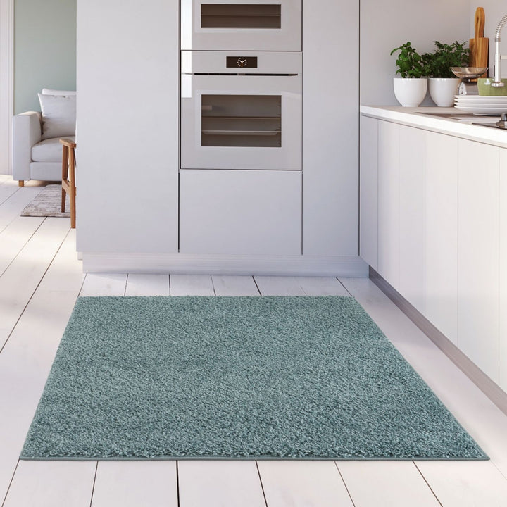Shaggy duck egg blue rug high quality, thick pile 30 mm, easy to clean.