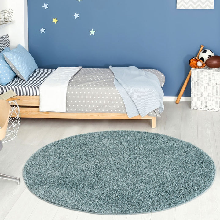 Shaggy duck egg blue rug high quality, thick pile 30 mm, easy to clean.