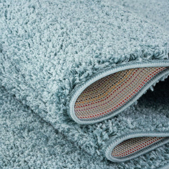 Shaggy duck egg blue rug high quality, thick pile 30 mm, easy to clean.