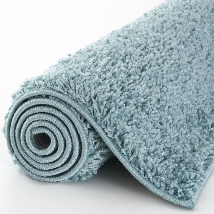 Shaggy duck egg blue rug high quality, thick pile 30 mm, easy to clean.