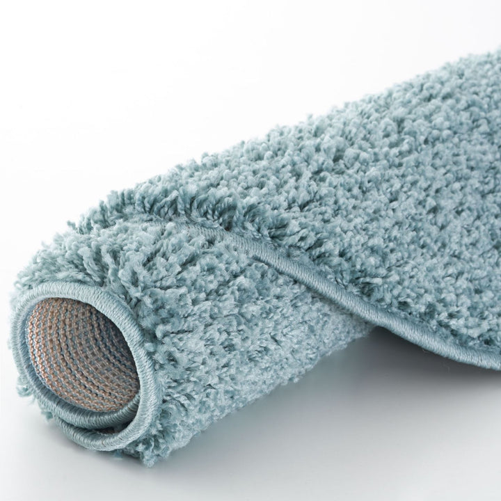 Shaggy duck egg blue rug high quality, thick pile 30 mm, easy to clean.