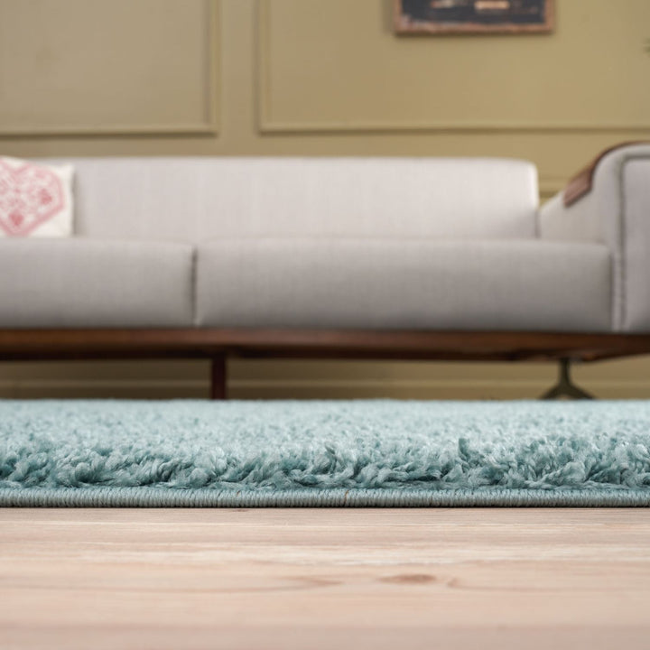 Shaggy duck egg blue rug high quality, thick pile 30 mm, easy to clean.