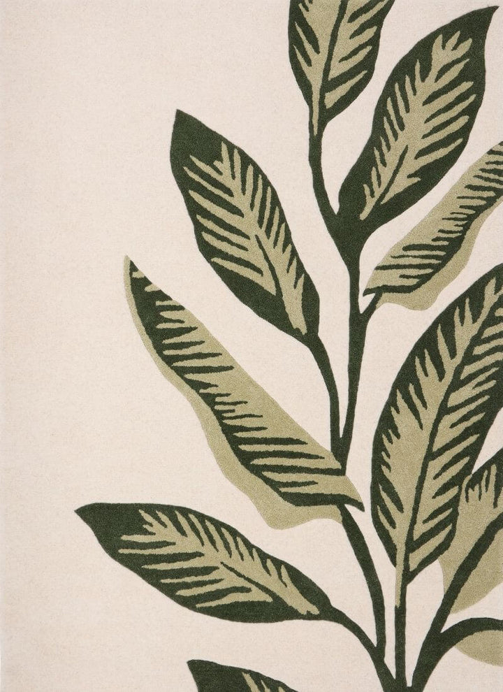 Hand-tufted cream and green wool rug featuring elegant leaf design, perfect for adding natural beauty to indoor spaces.