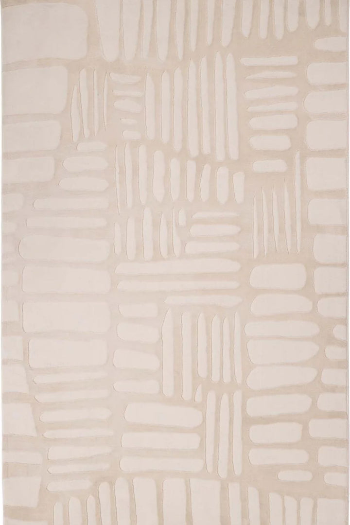 Beige and white geometric patterned rug