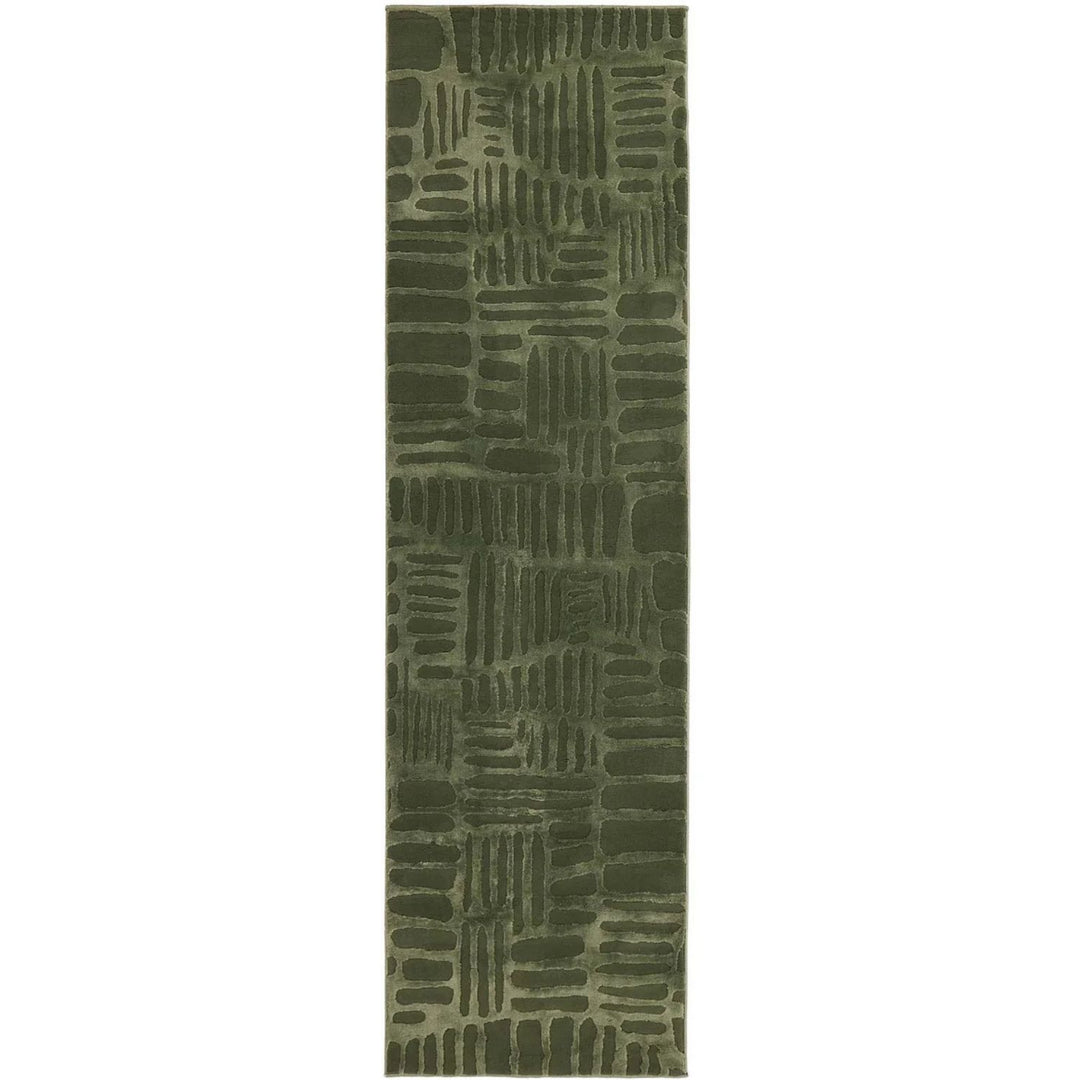 Green patterned rug on a white background