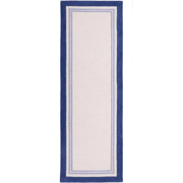 Rectangular rug with blue border on a white background