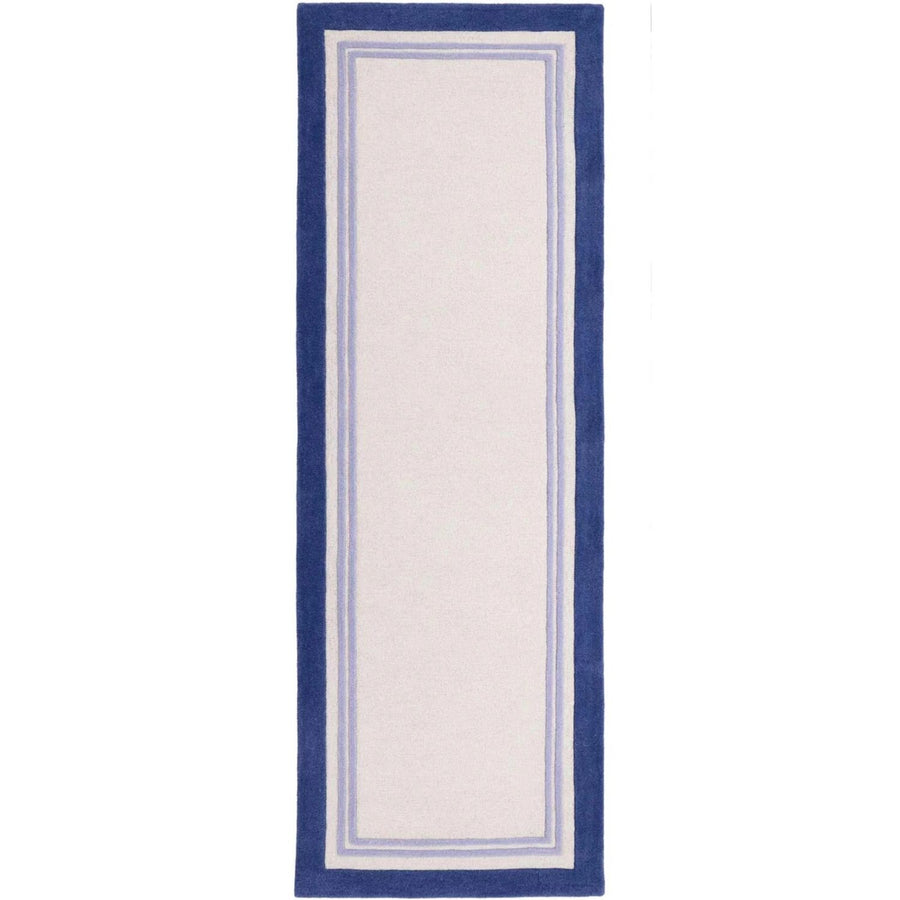 Rectangular rug with blue border on a white background