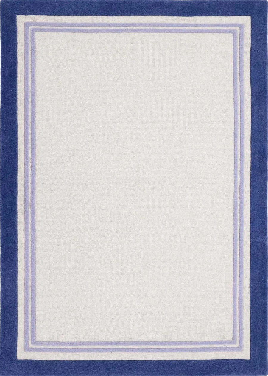 Rectangular rug with a blue border on a white background
