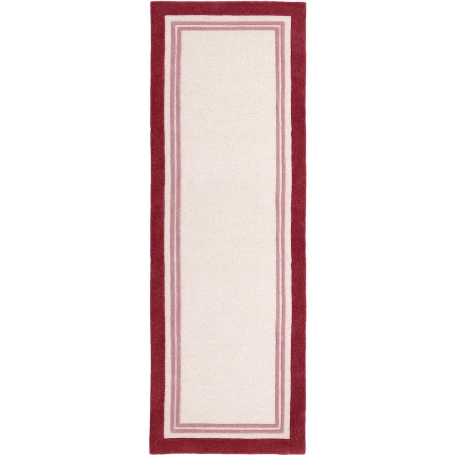 Rectangular rug with a red border on a white background