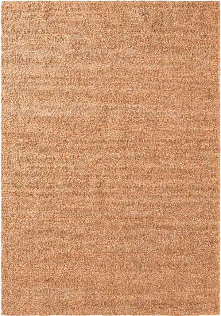 Beige area rug with a textured pattern