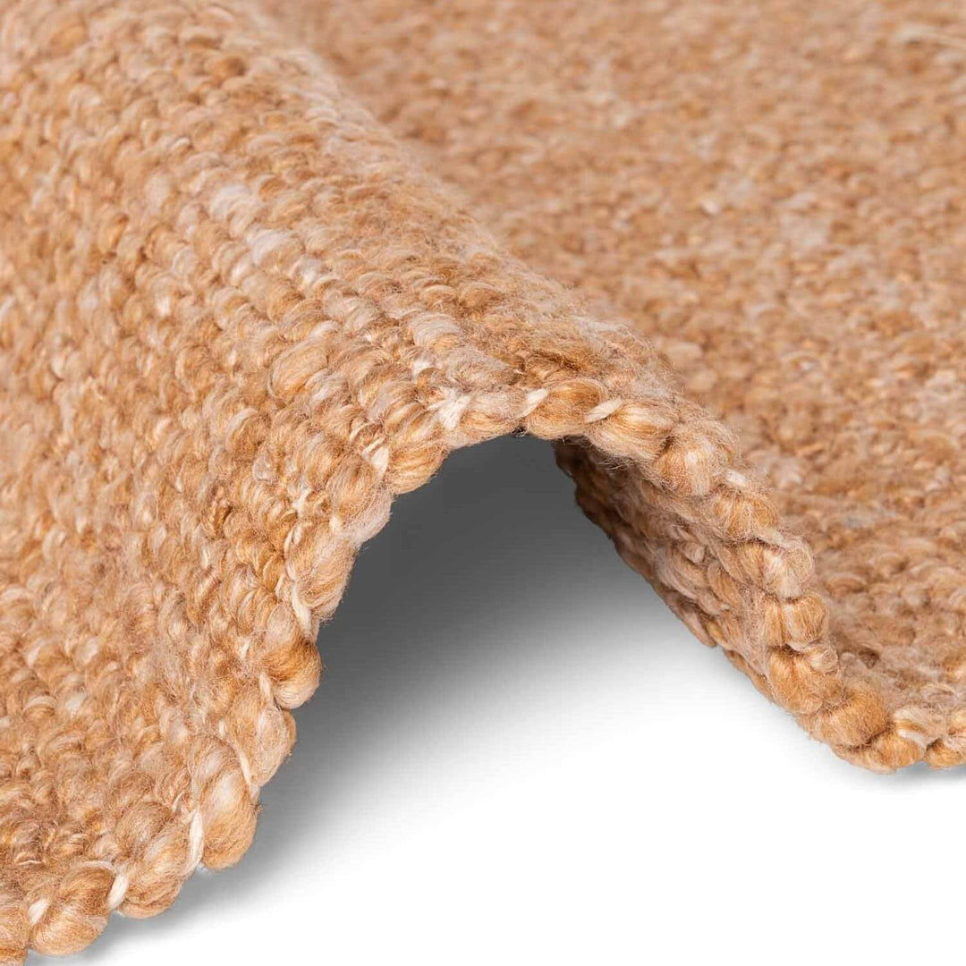 Close-up of a textured brown carpet