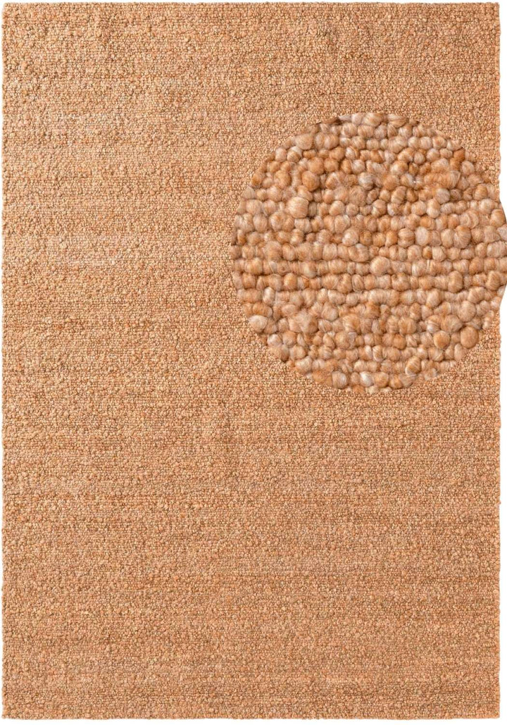 Textured beige rug with a circular pattern in the center