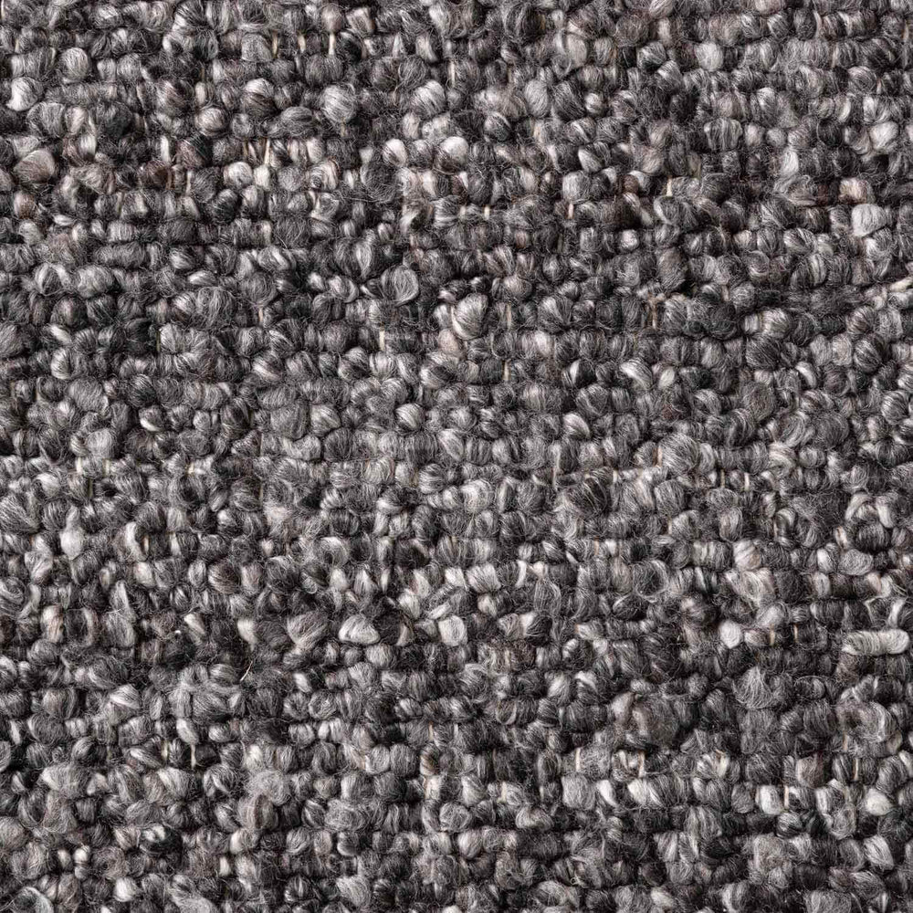 Close-up of a textured gray fabric surface