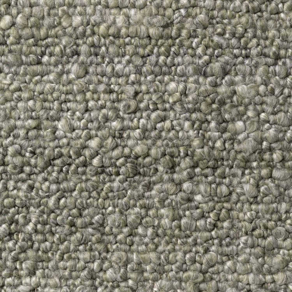 Close-up of textured green carpet
