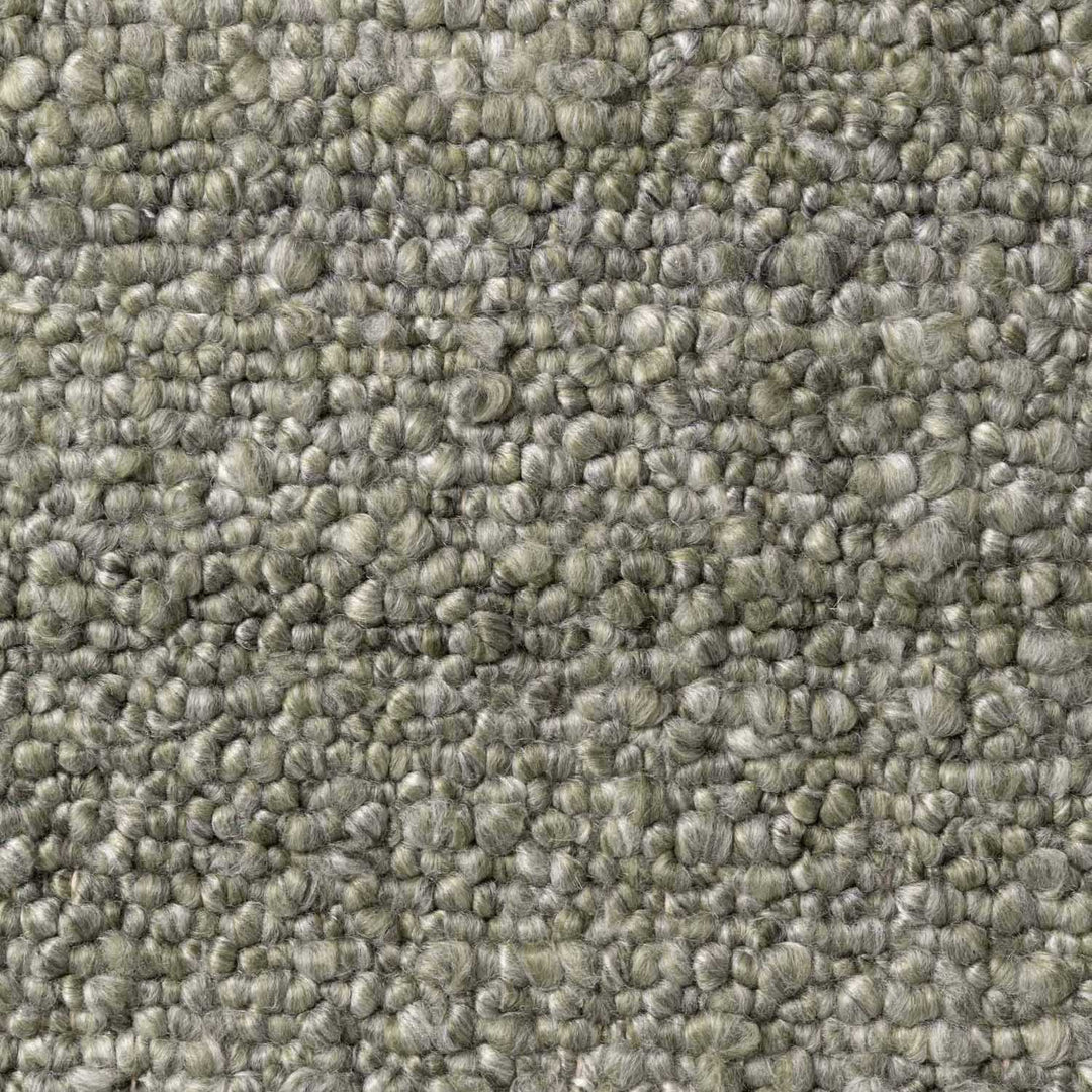 Close-up of textured green carpet
