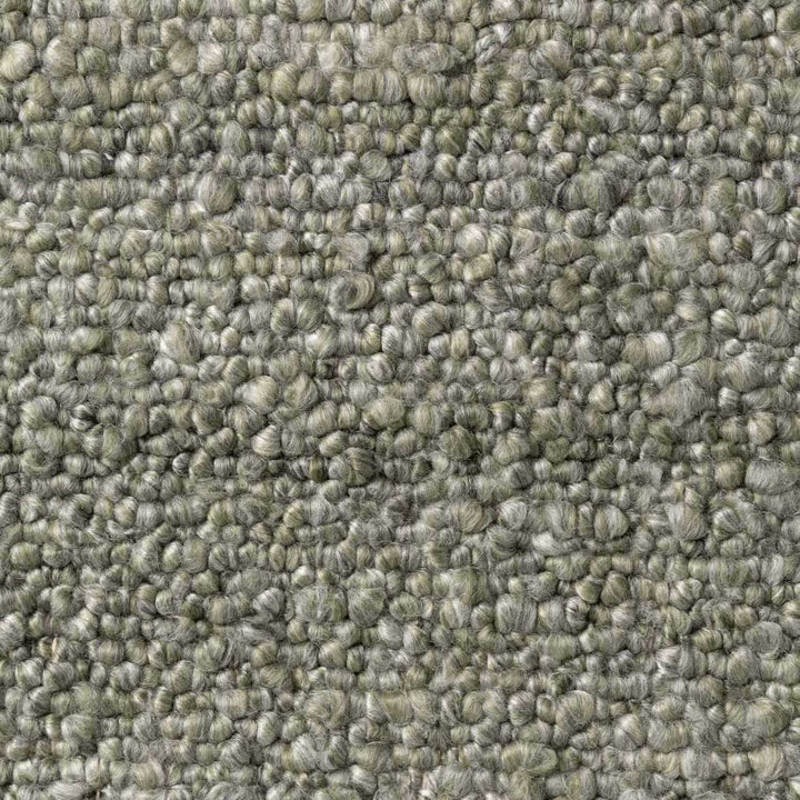 Close-up of textured green carpet