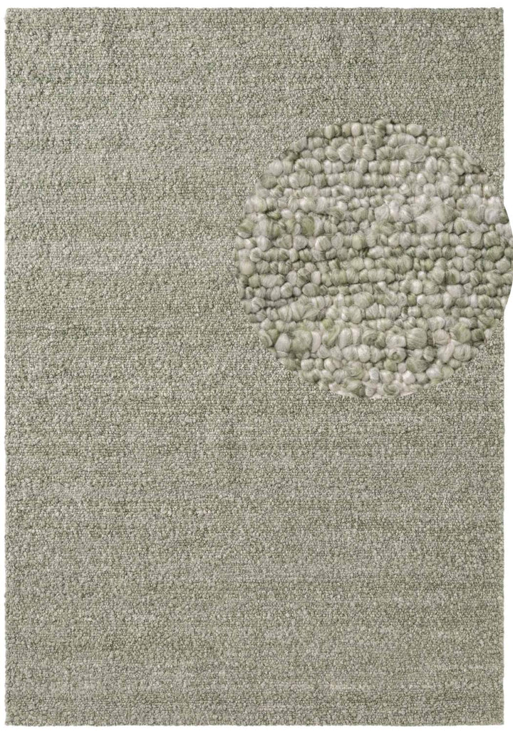 Textured rug with a circular pattern in a neutral color