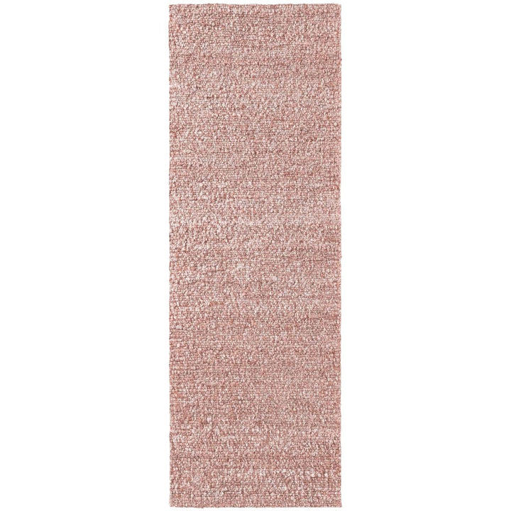 Rectangular pink rug on a white background