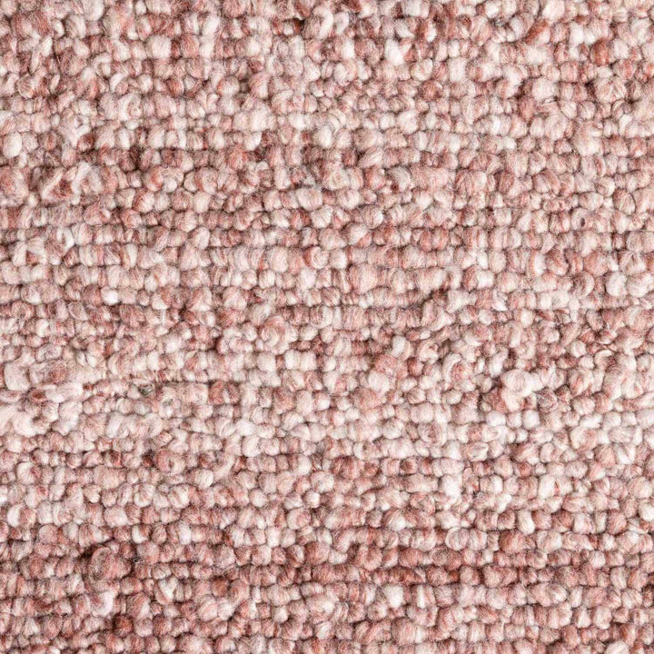 Close-up of pinkish-brown textured carpet