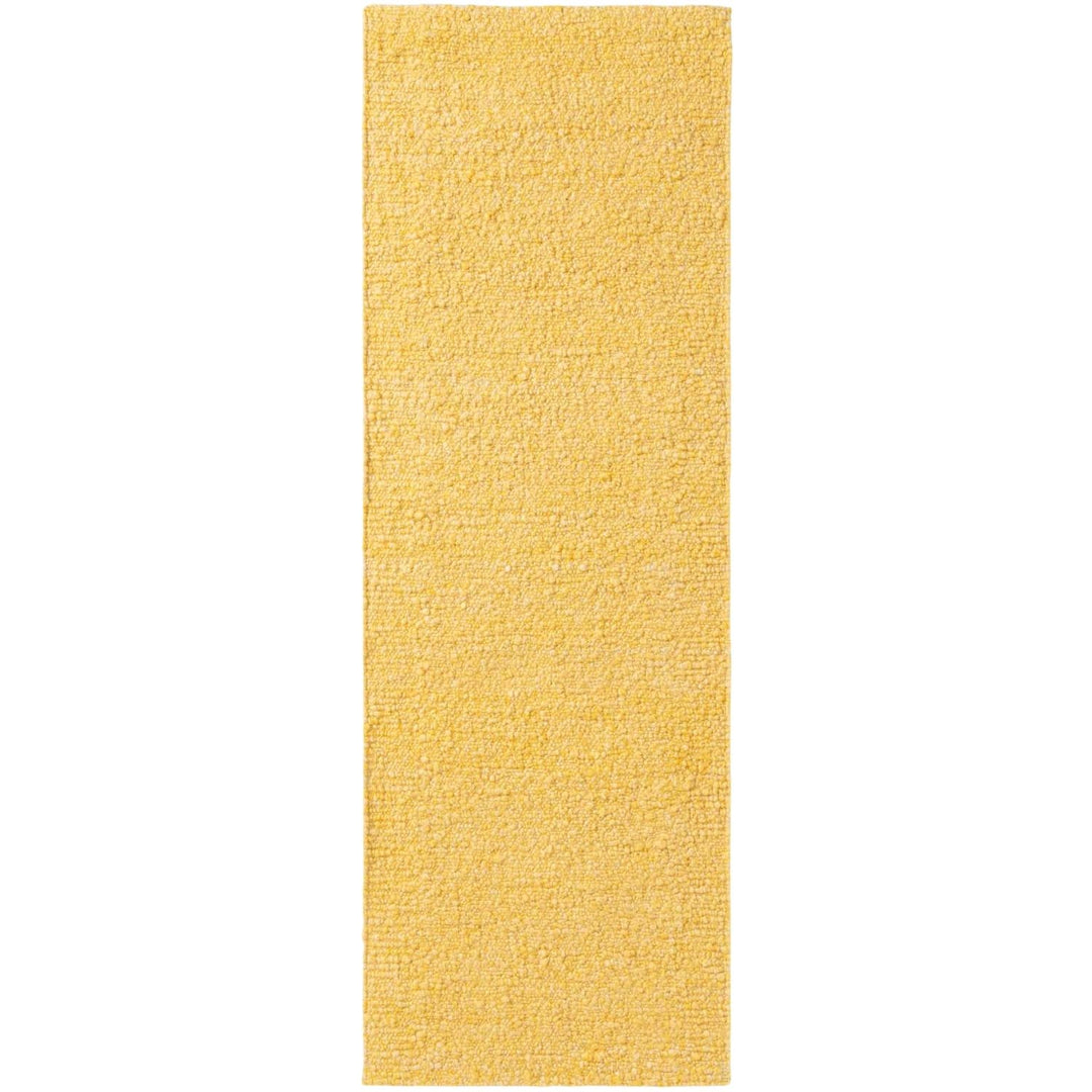 Yellow rectangular rug on a white background