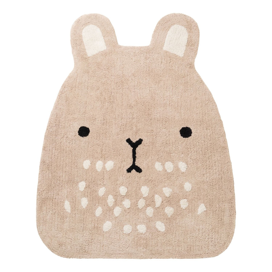 Beige animal-shaped rug with a face design on a white background