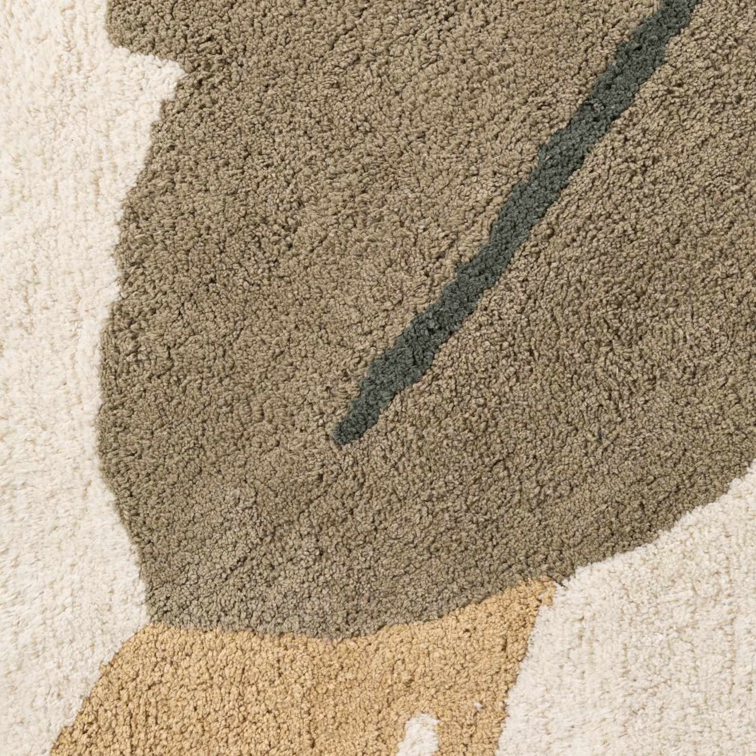 Close-up of a textured rug with geometric pattern
