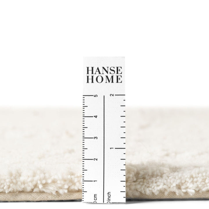 Hanse Home rug with a ruler for scale on a white background
