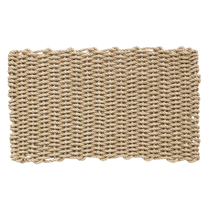 Woven mat made of natural fibers on a white background
