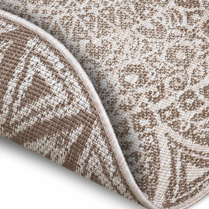 Round Lilja Vintage Brown Rug, reversible outdoor-indoor rug.