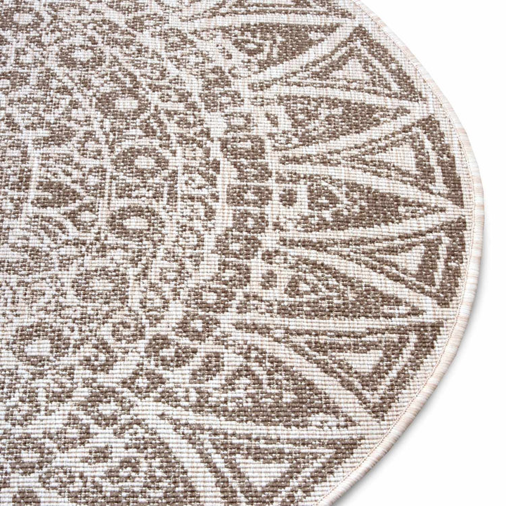 Round Lilja Vintage Brown Rug, reversible outdoor-indoor rug.
