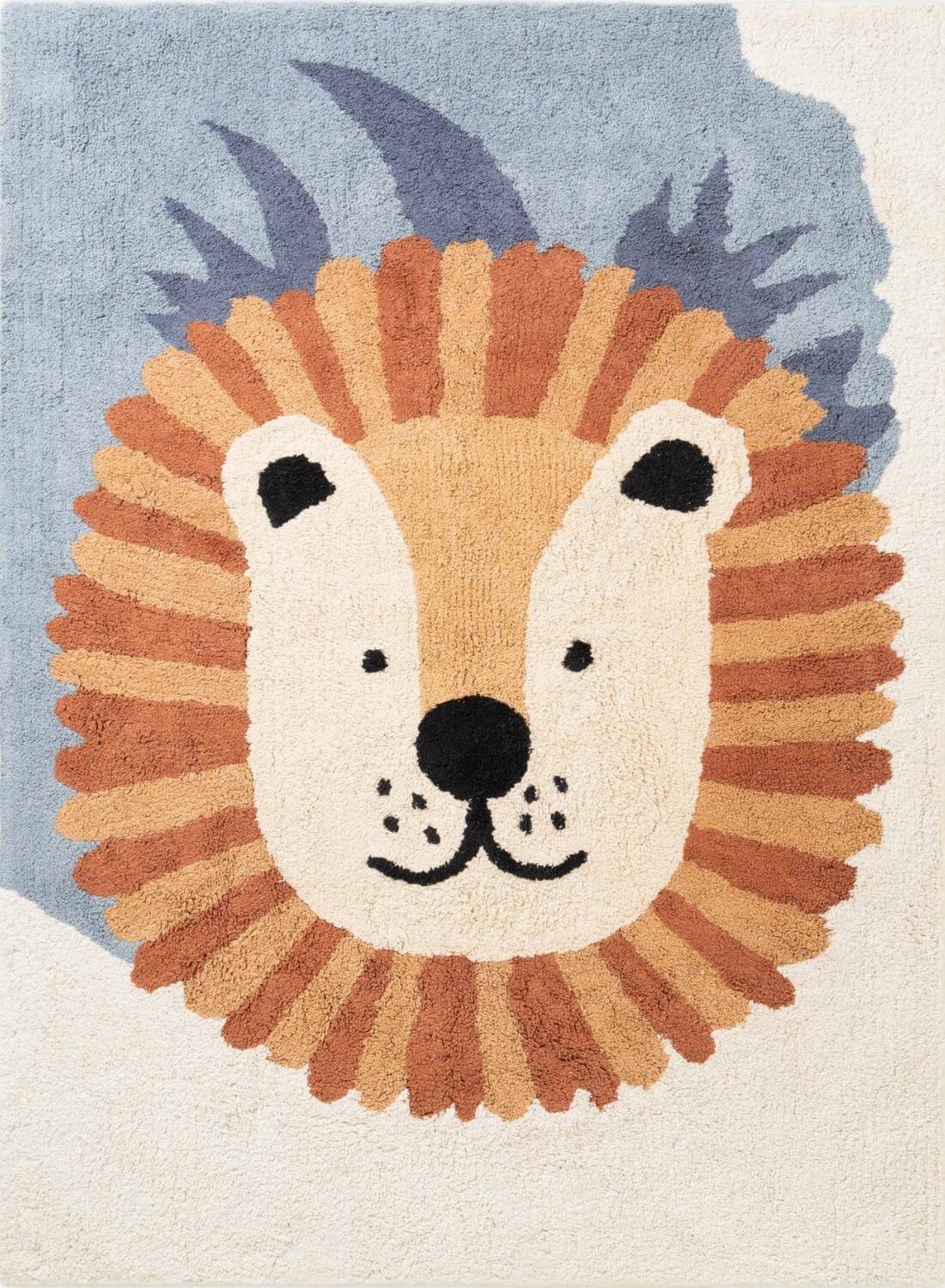 Rug with a lion face design on a blue and beige background