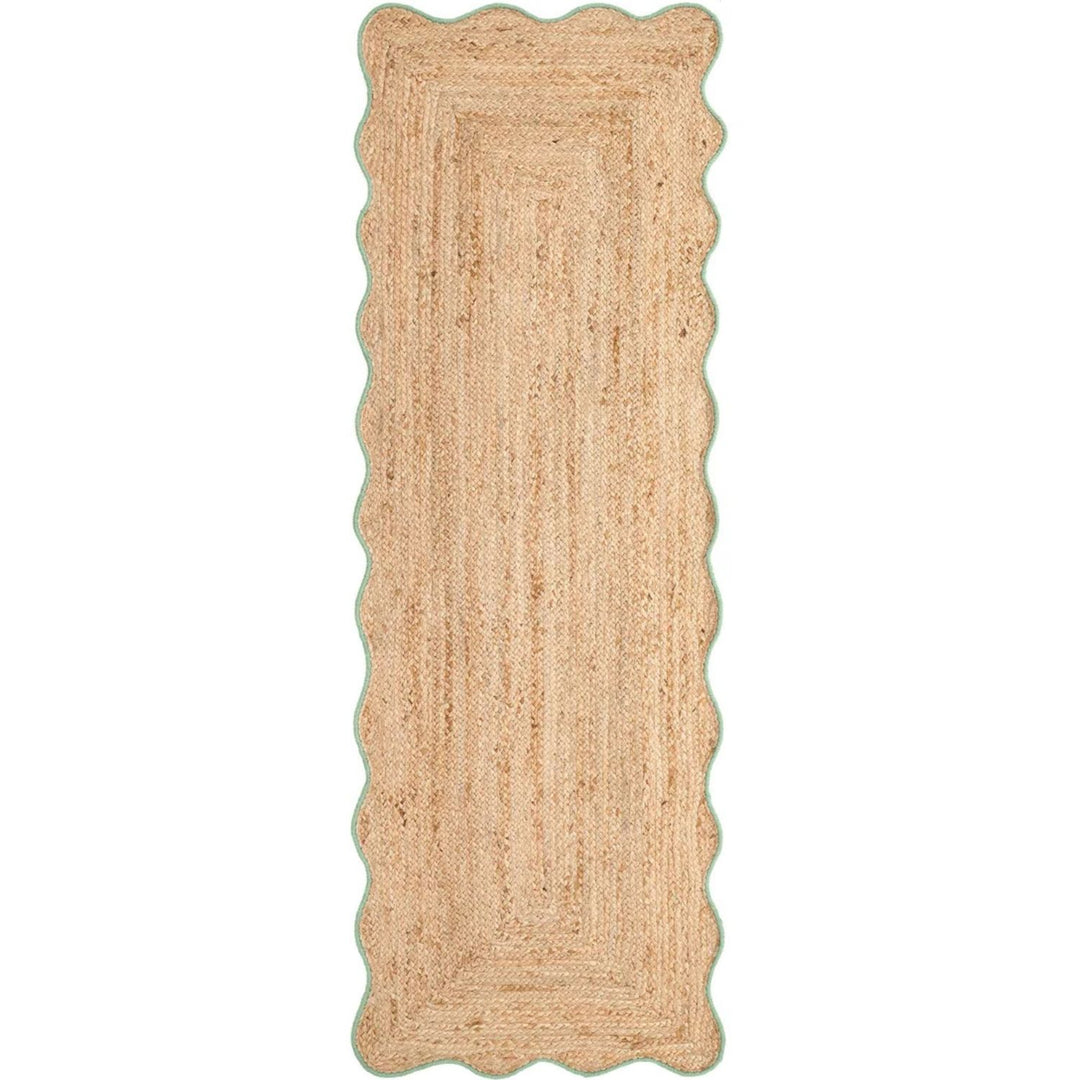 Beige braided rug on a white background