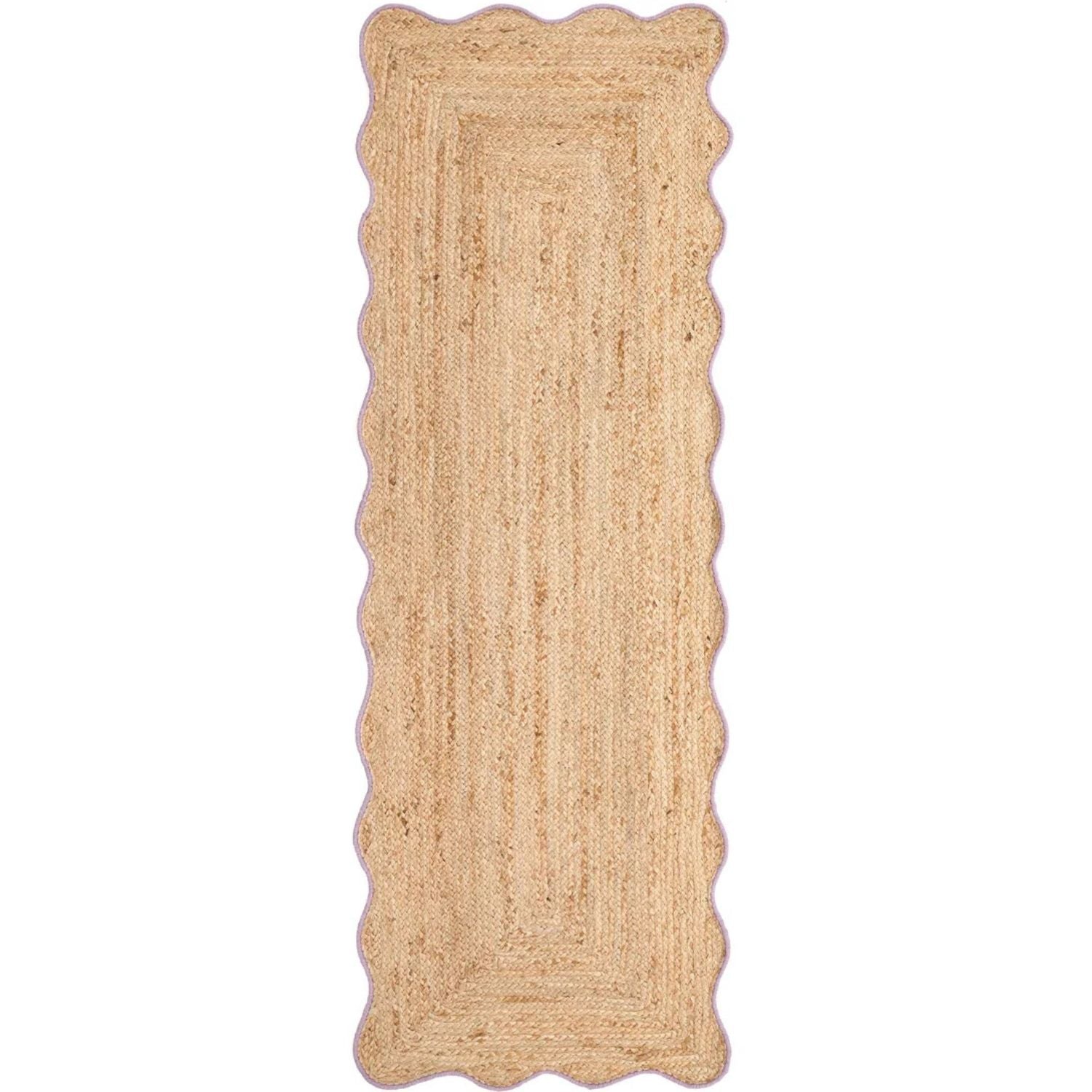 Beige braided rug on a white background