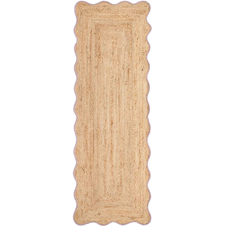 Beige braided rug on a white background