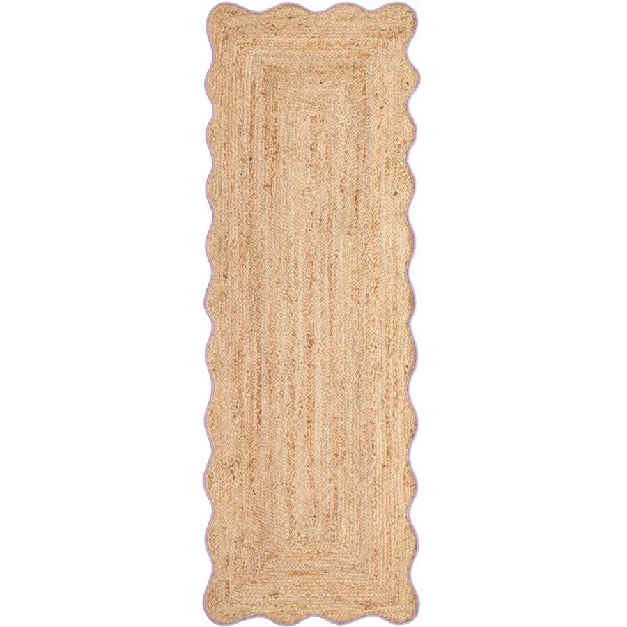 Beige braided rug on a white background
