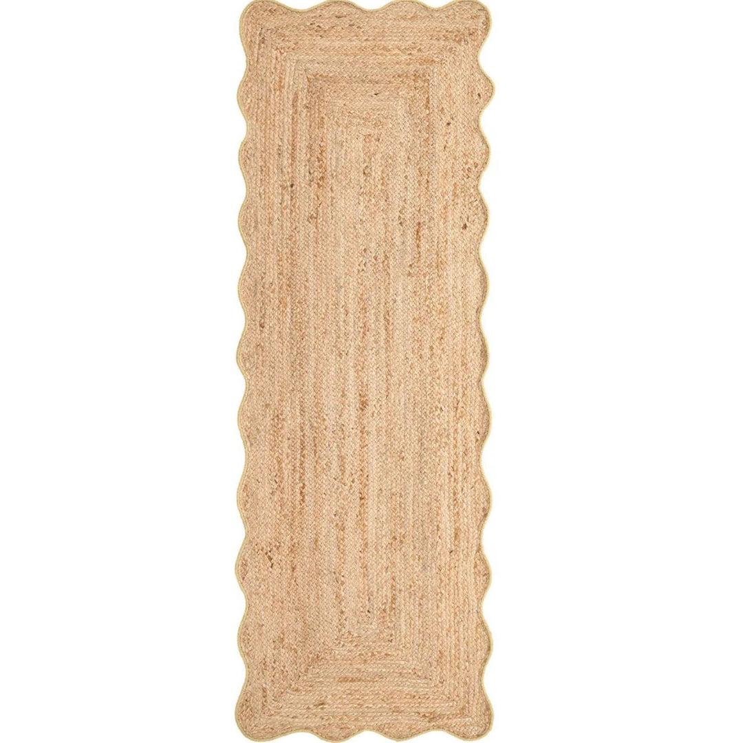 Beige braided rug on a white background