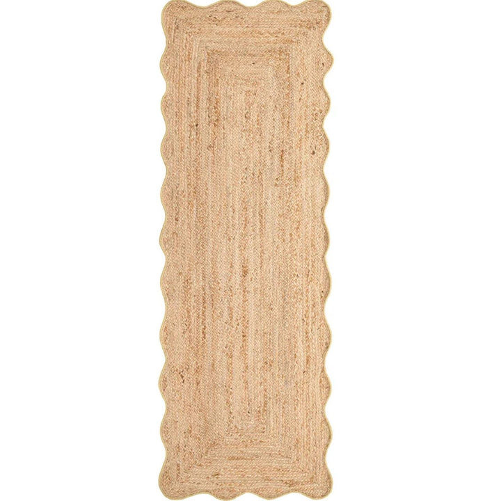 Beige braided rug on a white background