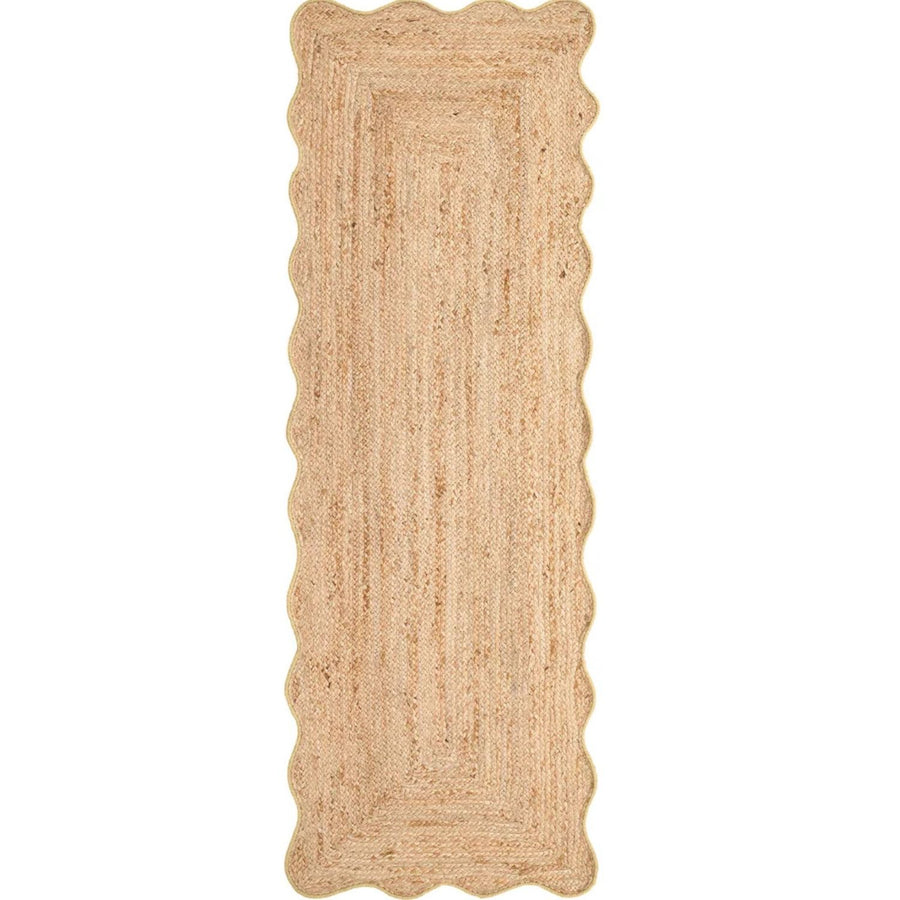 Beige braided rug on a white background