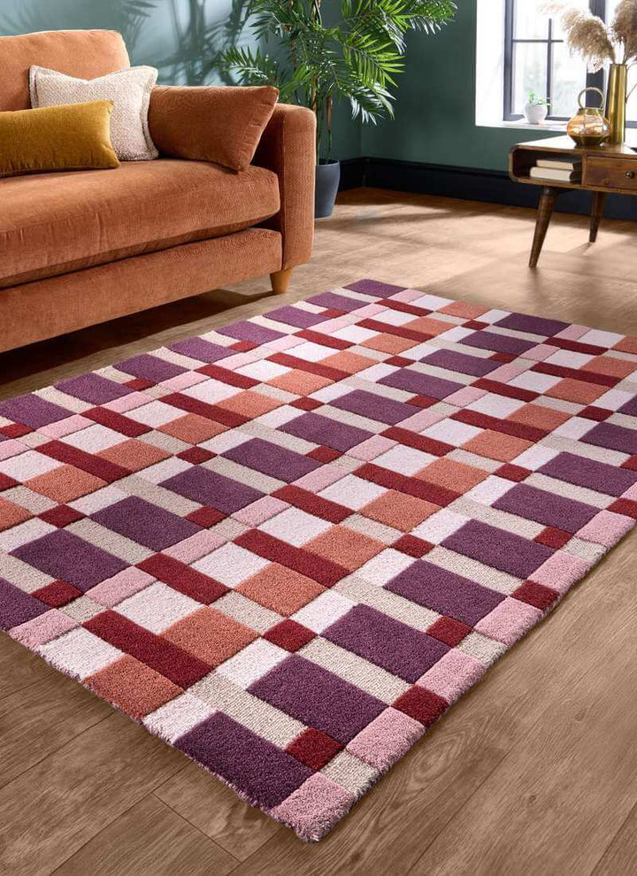 Hand-carved wool geometric rug in multicolours, featuring a bold block design, ideal for modern home decor.