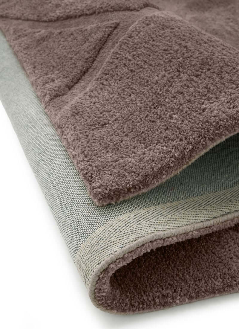 Soft cream and grey Scandinavian deep pile rug showcasing plush texture and durable cotton backing.