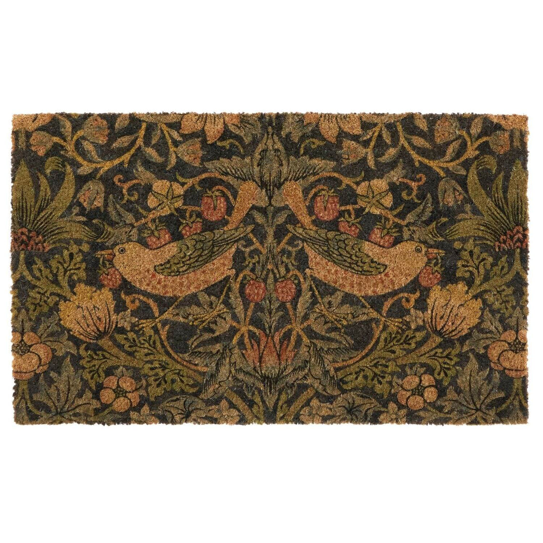 Decorative doormat with bird and floral pattern on a white background