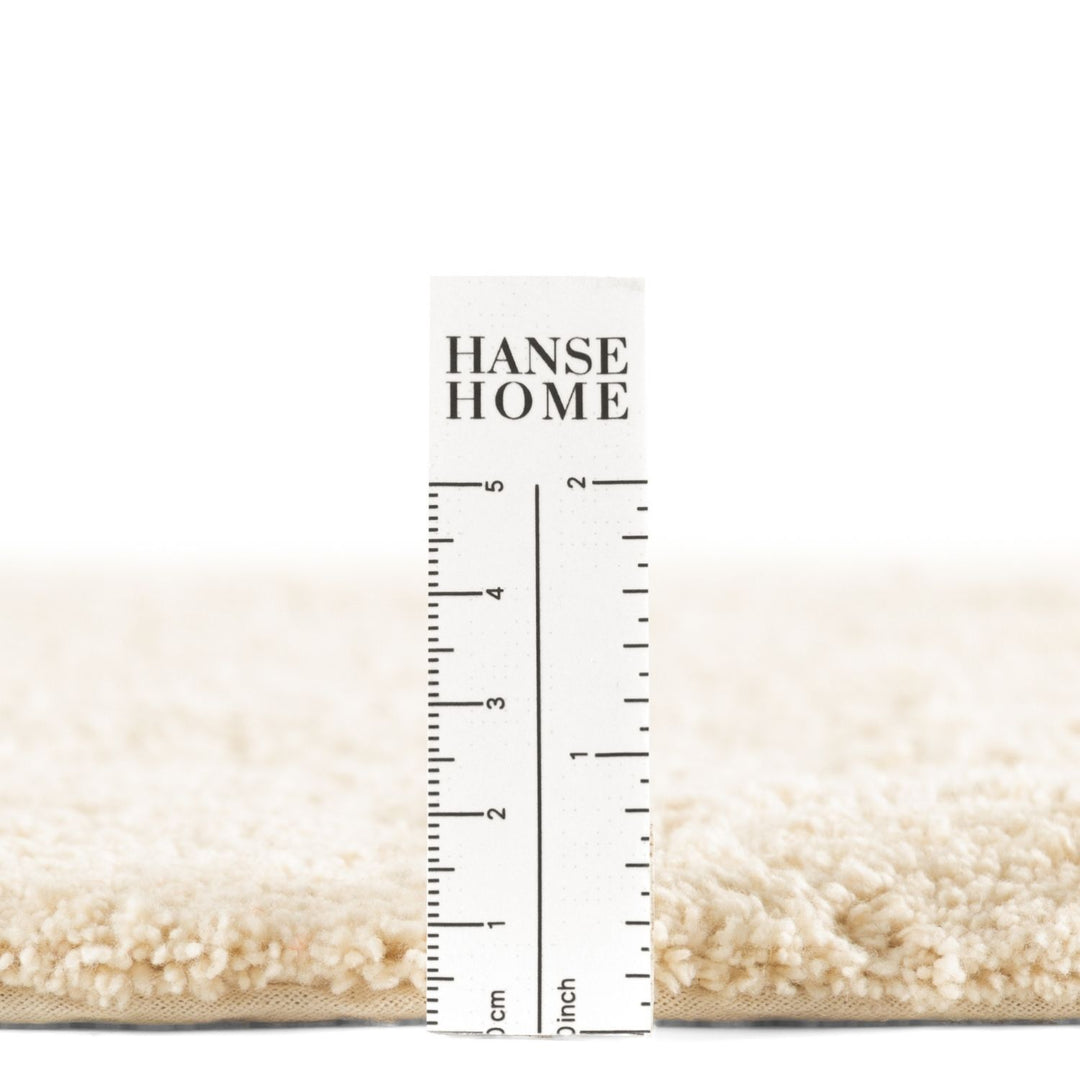 Hanse Home rug with a ruler for scale on a white background